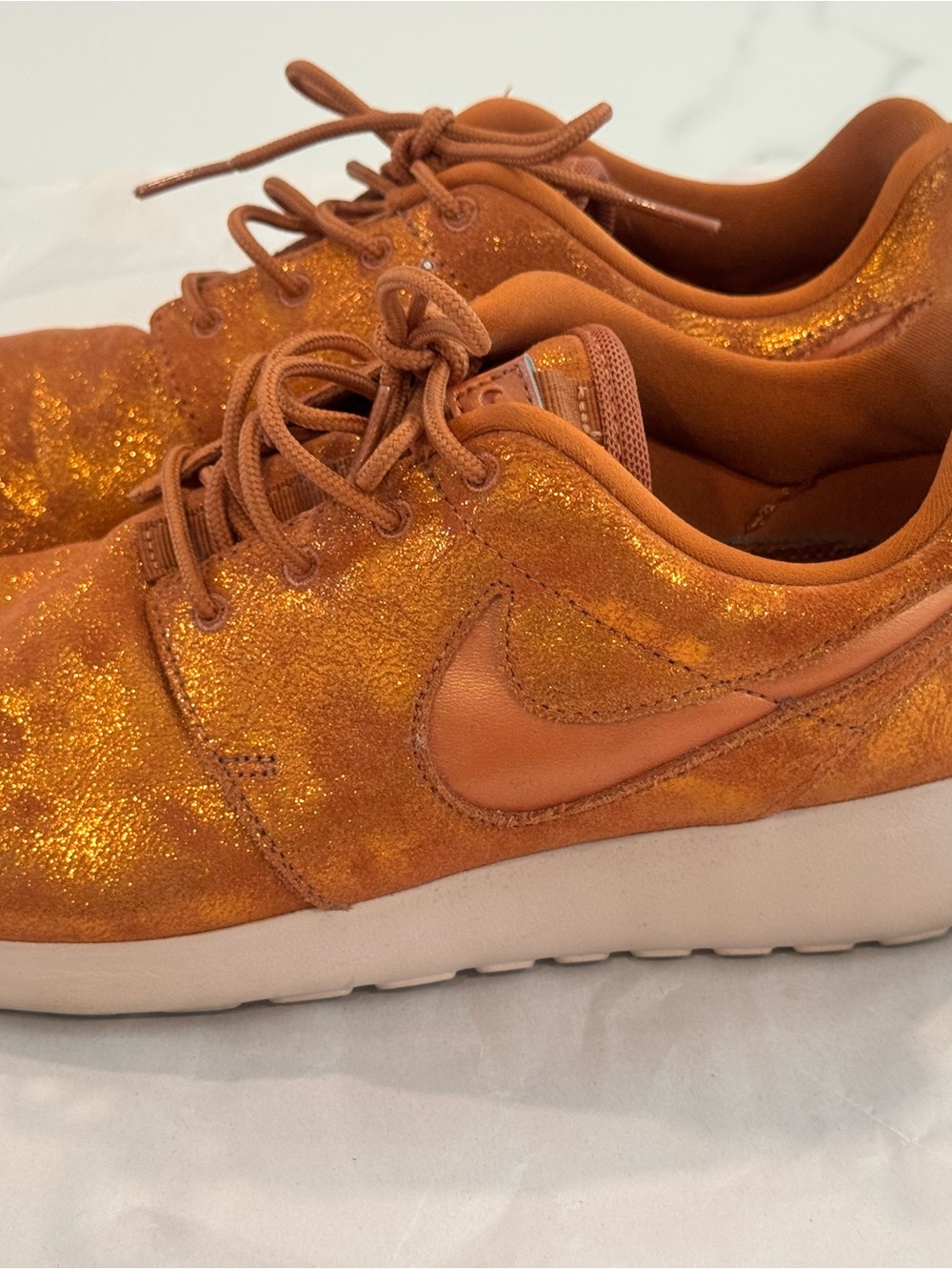 Nike Women’s Glitter Orange Low-Top Sneakers